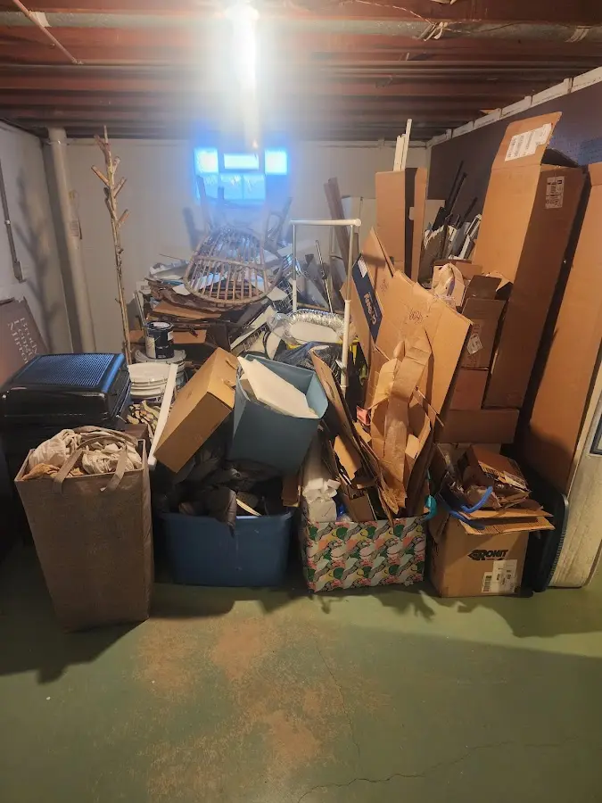 Roll-off dumpster container at job site for 2 Yard Dumpster Rental in Lakewood